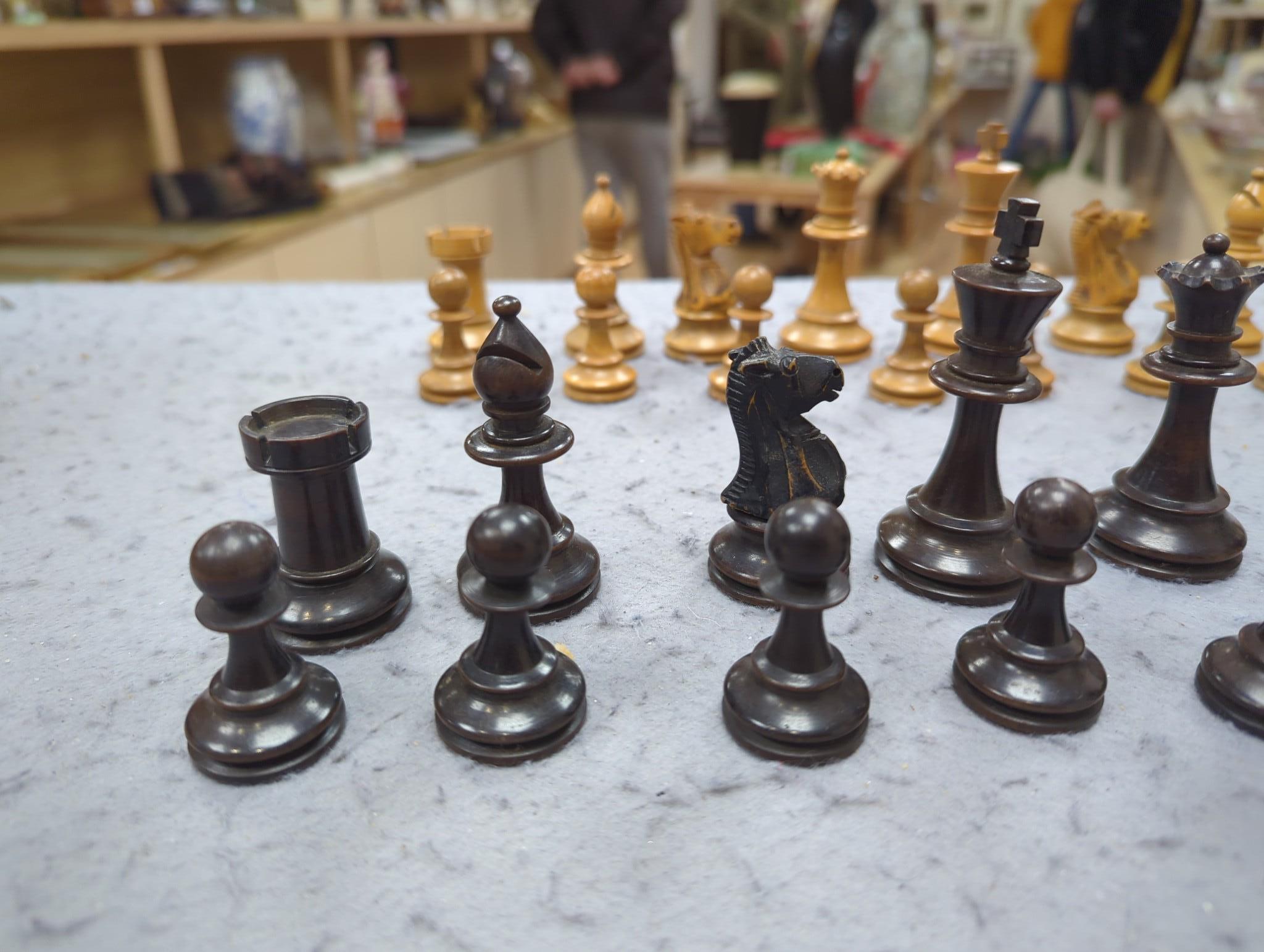 After Mene, a bronze greyhound, a Staunton-pattern chess set and a set of Victorian postal scales, bronze 22cms wide